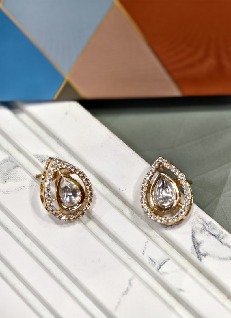 Elegance Brass Earrings With Adorned Diamonds And White Motifs